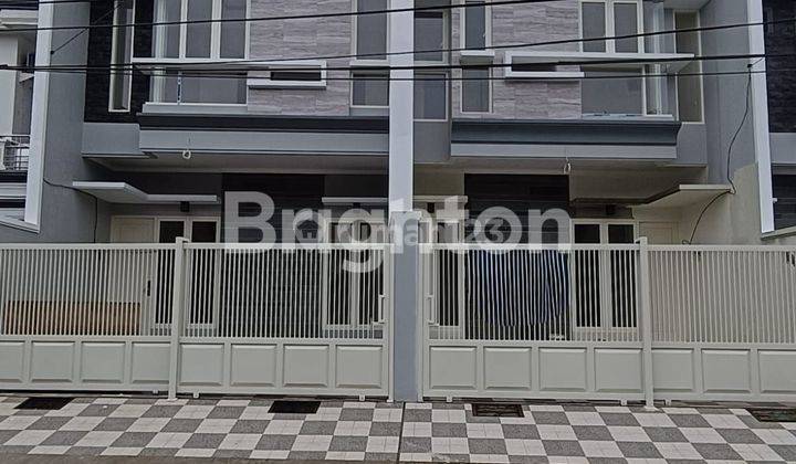 RUMAH MINIMALIS 2 LANTAI DI NGINDEN SURABAYA 1