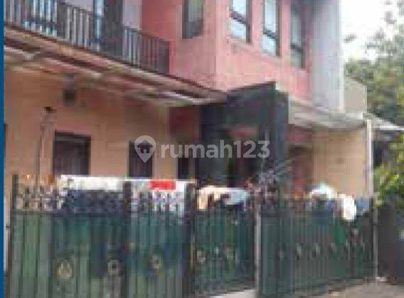 tampak depan unit lelang rumah 2 lt