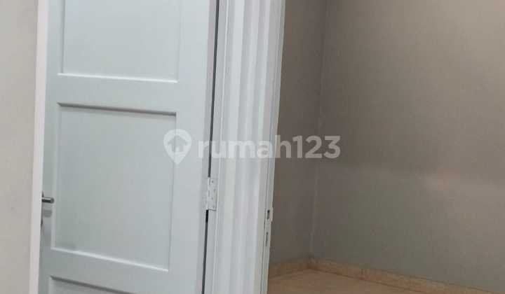 Rumah 1,5 lantai Siap Huni Rapi Di Cluster Grassia, Banjar Wijaya 2