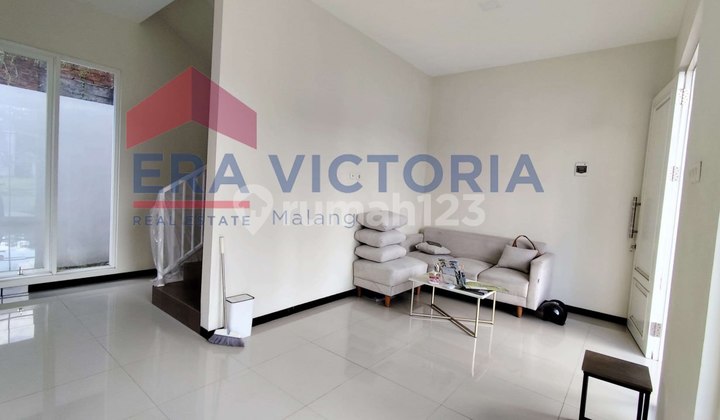 rumah minimalis modern siap huni dengan nuansa hijau kota malang 2