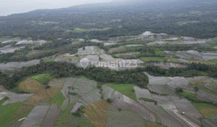 Vacant land for sale On the edge of the main road In front of the paddy field & Mount Batu Karu 1