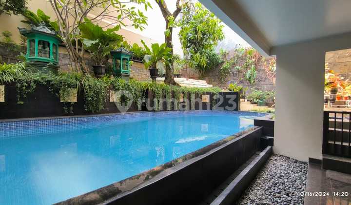 *For Sale* Prime Location! Rare Find in Pondok Indah, Jl Sekolah Duta. Sanctuary in the Heart of the City. Land Area: 555 m², Building Area: 398 m², Bedrooms: 4+3, Bathrooms: 3+1, Garage: 2, Carport: 2, Electricity: 15,000 VA, Swimming Pool, Water: PAM & Well, Certificate: SHM, Price Reduced to: 28 M Negotiable