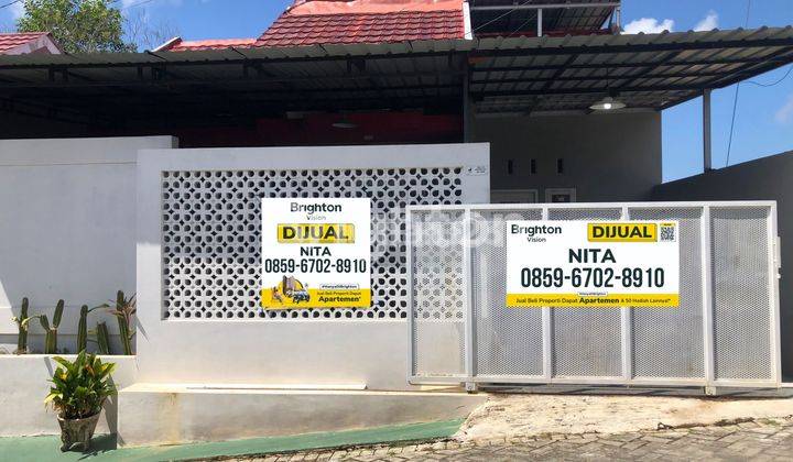 RUMAH 1,5 LANTAI DI PERUMAHAN TENGAH KOTA