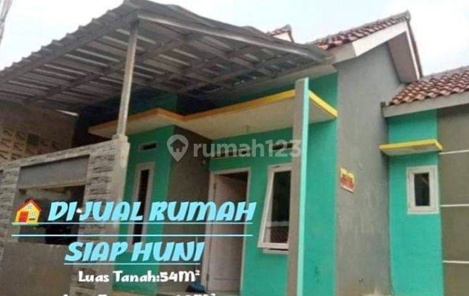 rumah di pasir putih 
dekat kolam renang putri duyung  2