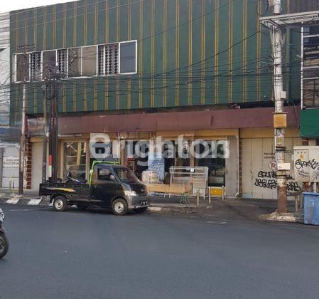 Investasi Rumah Pusat Kota Pinggir Jalan Utama