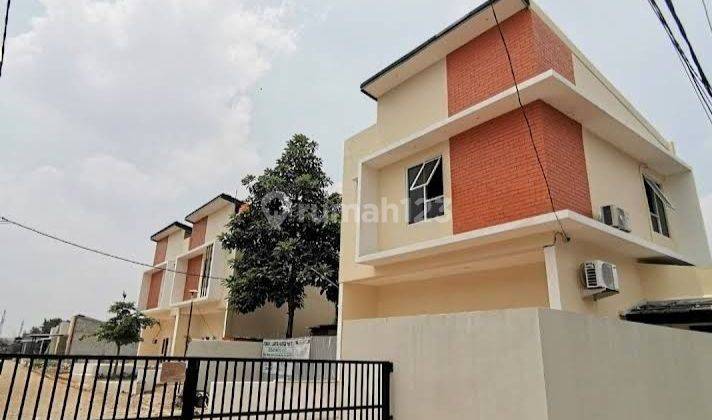 Dijual Rumah Modern 2 Lantai Di Cluster Reni Icon Type Mezzanine Pamulang Baru. 2