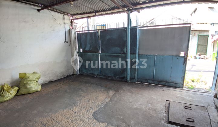 House in Tambak Laban Directly in Front of the Gas Station