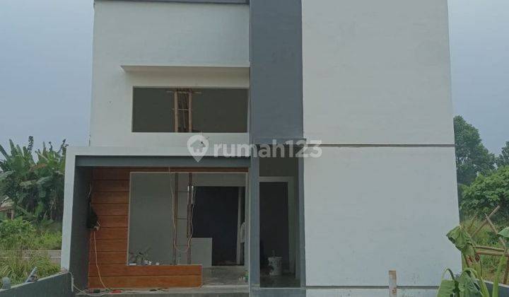 RUMAH CANTIK DALAM CLUSTER PINGGIR JALAN KALISUREN BEBAS BANJIR, COCOK UNTUK TEMPAT TINGGAL DAN INVESTASI 1