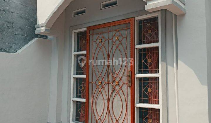 Di Jual.rumah 2 Lantai Dalam Cluster Taman Harapan Baru Bekasi 2