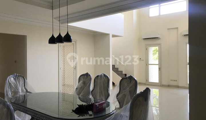 Puri Galaxy House Hook Layout Spacious Carport and 2-Car Garage 2