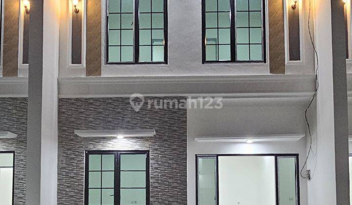 RUMAH 2 LANTAI SIAP HUNI JATISAMPURNA 1