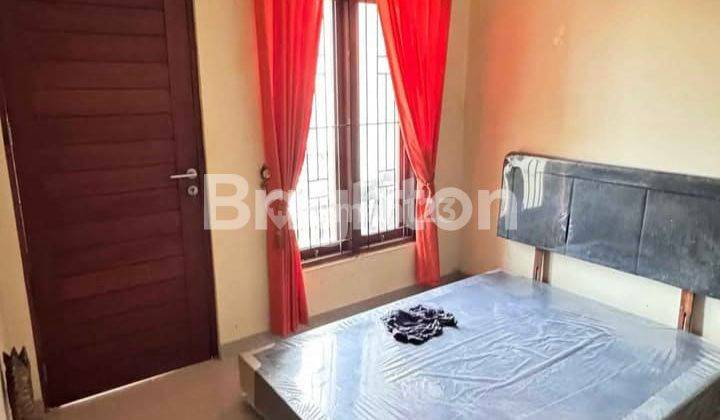 RUMAH MONANG MANING JL RESIMUKA 2