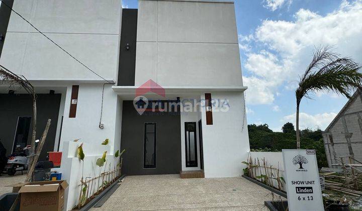 Rumah minimalis modern dalam Cluster One Gate System area Dieng Tidar 1