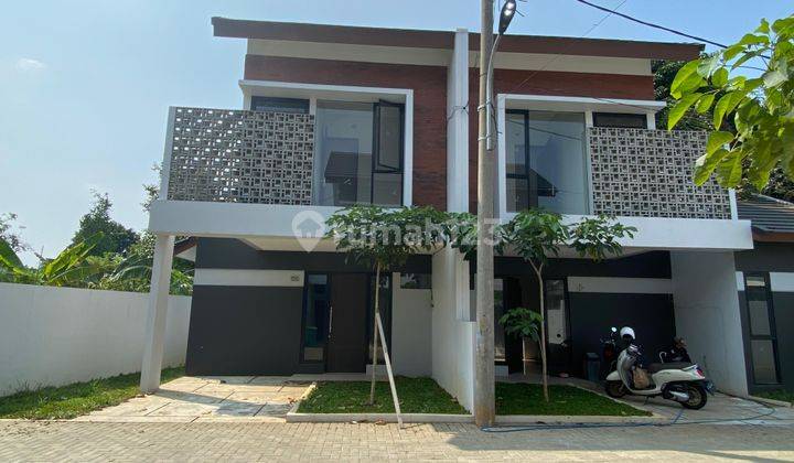 Rumah Modern Minimalis Teras Grandwiz Mustikajaya 2