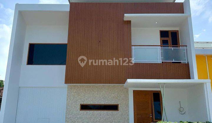 Rumah Mewah 2 Lantai Harga Murah Tepi Jalan Raya Tajem 1