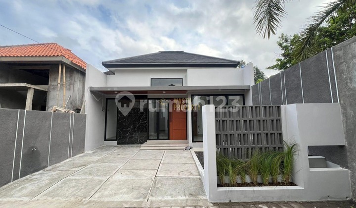RUMAH MODERN DALAM CLUSTER ONE GATE SISTEM DI BERBAH SLEMAN