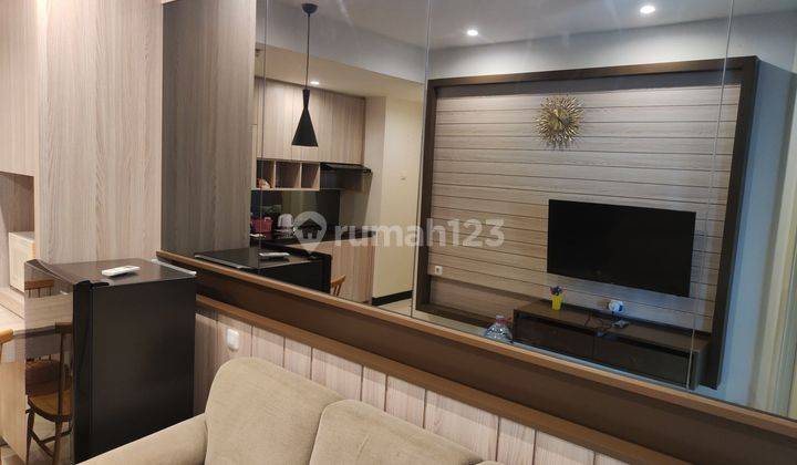 Apartemen Amor Pakuwon City 2 Kamar Tidur Furnished Bagus 1