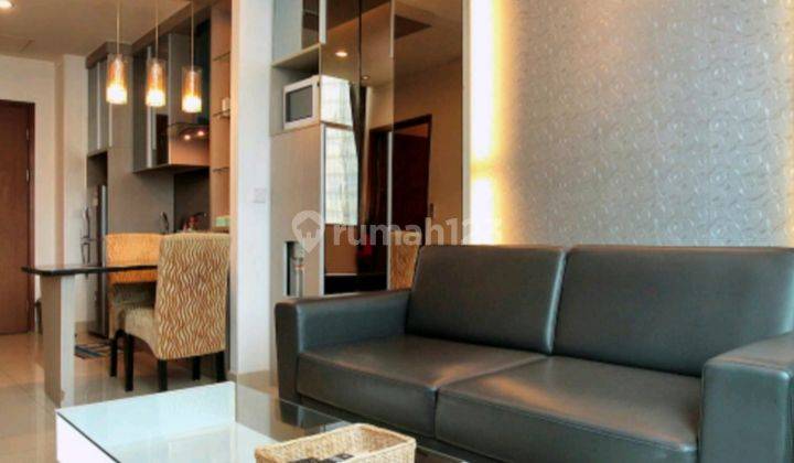 For Rent: Bright and Spacious 2-Bedroom Apartment (89 sqm) at Sahid Sudirman Residence, Fully Furnished with Stunning Pool View – Prime Location in Central Jakarta. 1