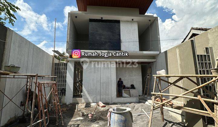 Rumah Model Industrial Mewah Full Furnished Di Purwomartani 1