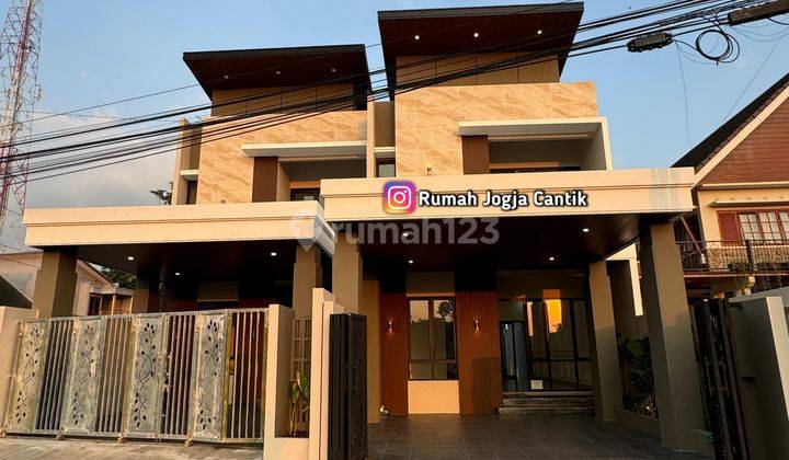 Rumah 2 Lantai Model Kontemporer Modern  1