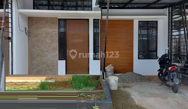 Rumah Bagus Unfurnished SHM di Cluster Raya Hasanah, Bekasi B0331 1