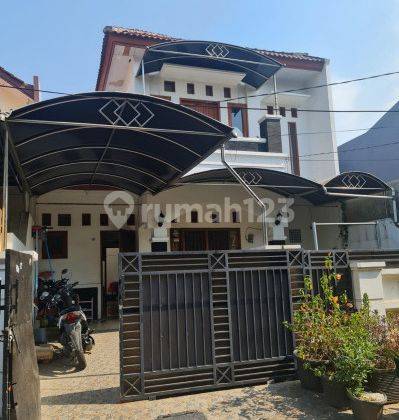 Rumah Kontrakan 2 Lantai Bagus Unfurnished SHM di Taman Harapan Baru , Bekasi B0057 1