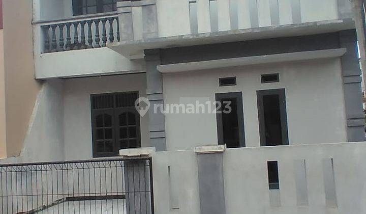 Rumah 2 Lantai Bagus Unfurnished SHM di Taman Harapan Baru,bekasi h0125  1