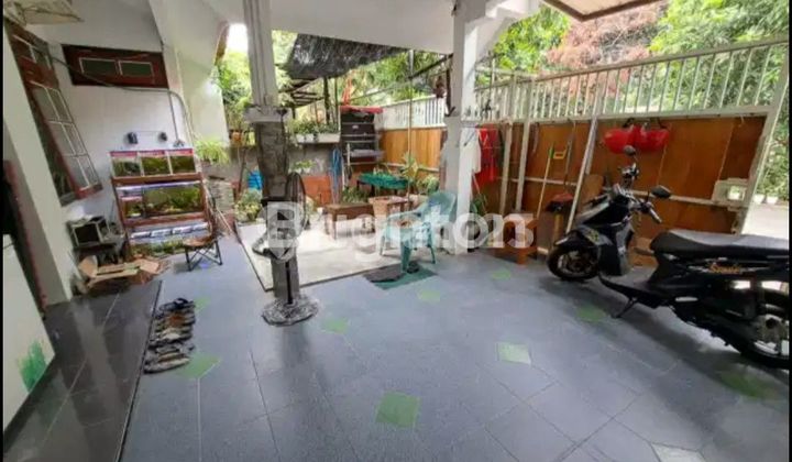 A serene house in front of public facilities at YKP Pandugo, East Surabaya.