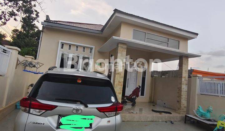 RUMAH BAGUS SERASA RUMAH BARU BONUS TANAH LUAS DI INDRAKILA 1