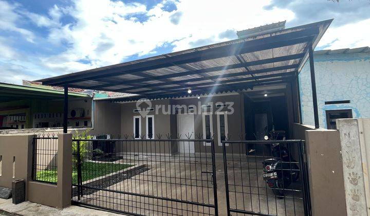 Jual cepat rumah terawat tanah luas di perkampungan 1