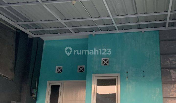 Rumah di Perumahan Puri Lidah Kulon Surabaya barat dekat pusat bisnis Surabaya pusat SHM 1