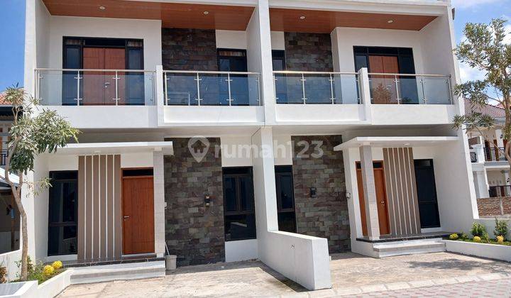 Rumah 2 Lantai Cantik Minimalis Limasan Gentan 1