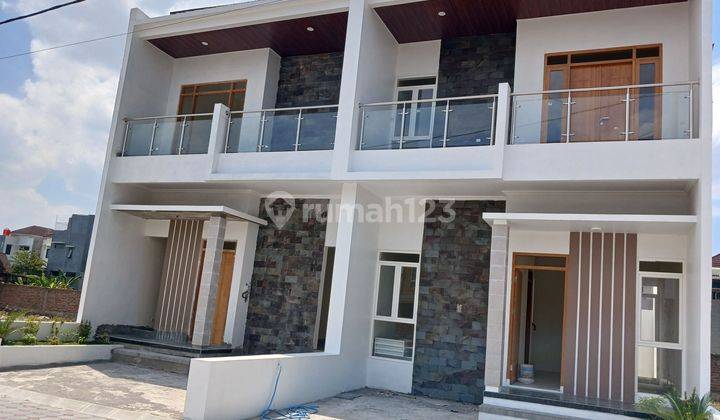 Rumah 2 Lantai Cantik Minimalis Limasan Gentan 2