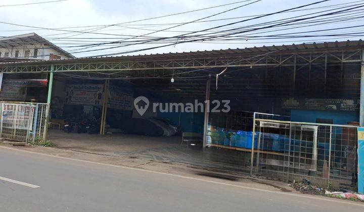 Dijual Tanah Ada Bangunan Bengkel di Graha Raya 1