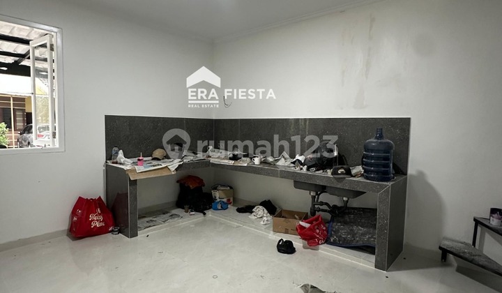 Rumah Terenovasi Dalam Cluster Di Alam Sutera 2