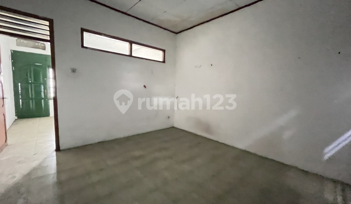 2-Story Shop House by a Busy Road in Pondok Gede 2