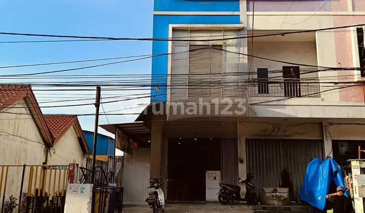 Nice 3-Story Shop House in a Densely Populated Area Near the Market in Kelapa Dua 1