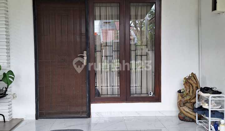 Nice House Ready to Live In, Wide Street Row, Close to Schools in Harapan Indah.