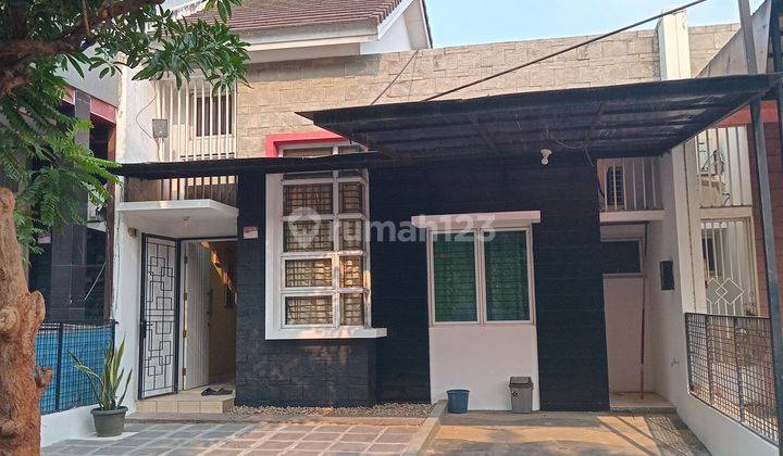 Rumah 1 lantai setengah di grandwisata 1