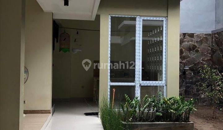 Murah Strategis Nyaman Di Jual Rumah 2 Lantai Bagus SHM di Dharmahusada Indah , Surabaya 2