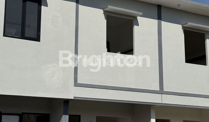 Minimalist House, only 100 meters to Mulyosari Main Road. 1