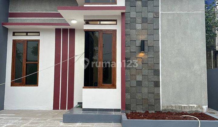 rumah kpr di pinggir jalan utama sawangan 1