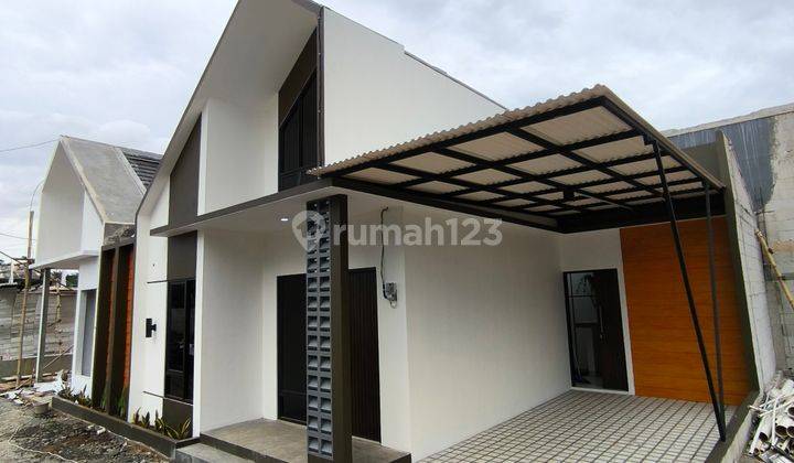 rumah kpr model mezzanine pinggir jalan utama 1