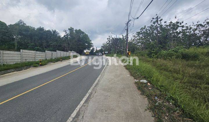 tanah di km 24 lokasi strategis di pinggir jalan besar 2