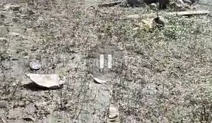 Land on the Side of the Main Road at Kilometer 15