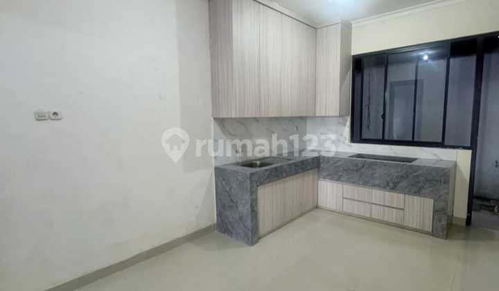 Neat House Ready to Occupied in Casa Jardin Residence Cluster, West Jakarta 2