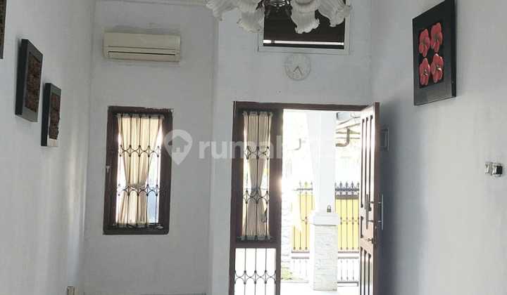 For Rent: Charming 2+1 Bedroom House, Move-In Ready, Renovated, Air Conditioning, Kitchen Set, Unfurnished, Flood-Free, Strategic Location, In Raffles Hills Cibubur, Good House with SHM Certificate. 2