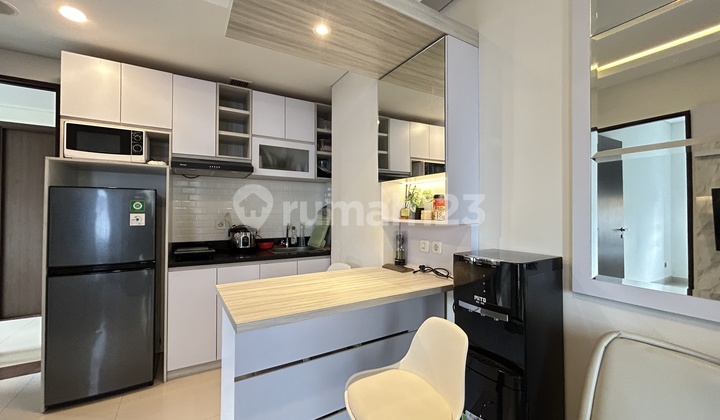 For Rent: 2 Bedroom Apartment at Trans Park @ Cibubur, Monthly, Fully Furnished, Move-in Ready. Aurora Tower, Swimming Pool View. Strategic Location. Rented: 2 Bedroom Apartment, Well Furnished.