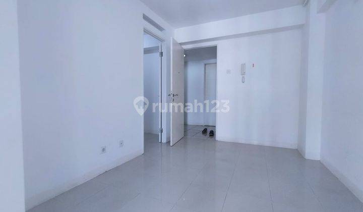 ruang tamu apartment unfurnished 2 kamar siap