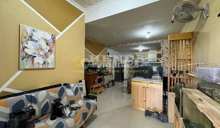 ruang tamu rumah siap huni marbella residence